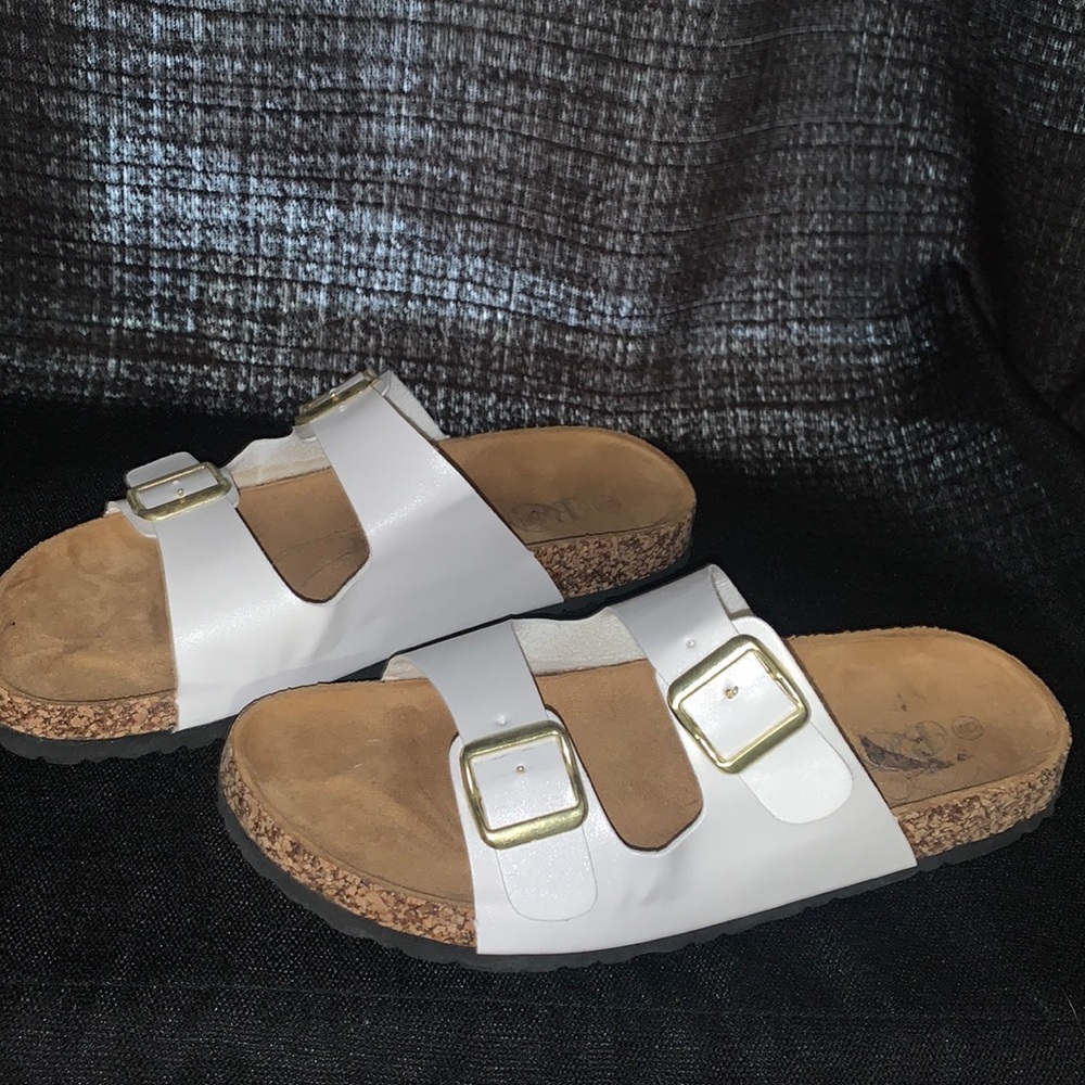 Too big. Never worn! white sandals.
